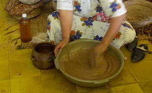 Handmade production of pure argan oil
