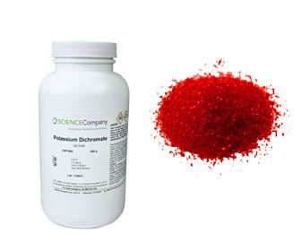 Potassium dichromate jar and solid crystals